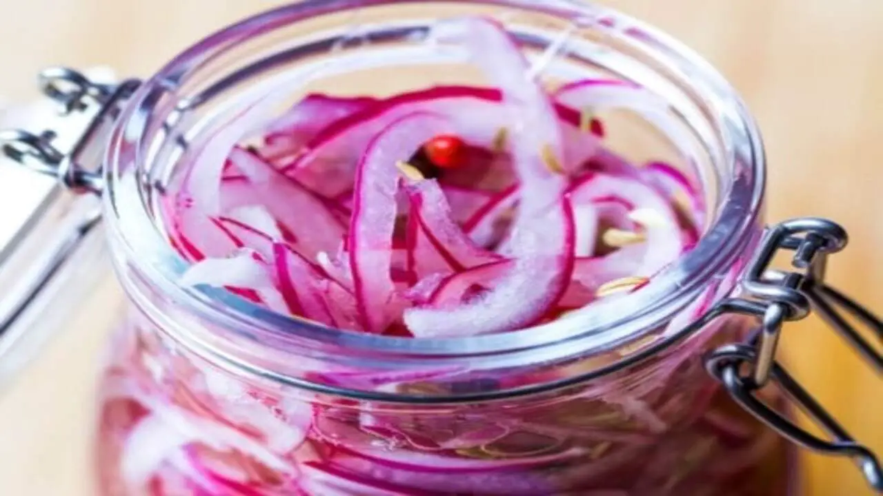 Combining The Onions And Pickling Liquid